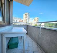 A balcony of a 1-room apartment with a view of the high-rise buildings of Bratislava - Karlova Ves.