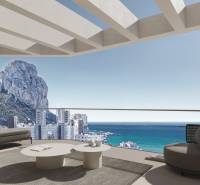 Terrace of a 3-bedroom apartment in Calpe with a view of the sea and the rock cliff.