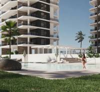Apartments with a pool and palm trees in Calpe, ideal for a 3-bedroom apartment.