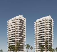 Modern residential towers in Calpe with palm trees and a blue sky, ideal for a 3-bedroom apartment.