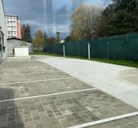 An empty parking space near warehouses and halls on Bytčická Street in Žilina.