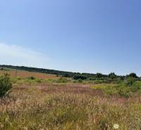 Extensive grassy plots suitable for living in Cabaj-Čápor on a sunny day.