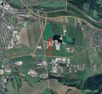 Aerial view of land in the Sučany area suitable for commercial purposes.