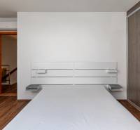 Bedroom with wooden floor and wardrobe, 5 or more room apartment.