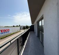 Balcony of a 2-room apartment with a view of Pezinska Street in Malacky.