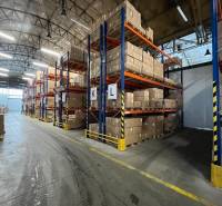 Warehouses and halls with shelves full of boxes and section labels K, L.