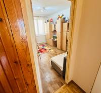 A room in a 3-room apartment with a bright space, wooden floor, and a window.
