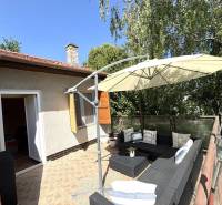 On the terrace of the cottage in Radvani nad Dunajom, there is comfortable seating with rattan furniture.