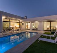 Villa in Calasparra with a pool and terrace in pleasant evening lighting.