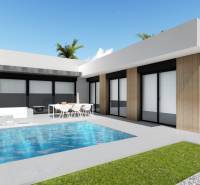 A villa in Calasparra with a pool, outdoor seating, and a garden, surrounded by palm trees.