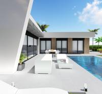 A terrace with a pool at a villa in Calasparra, surrounded by palm trees and greenery.