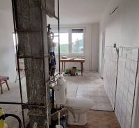 Renovation in a 3-room apartment with an open space and a view from the window.