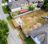 Plots - residential in Chocholná-Velčice, next to the road, adjacent to family houses and gardens.