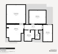 A family house with a layout containing a living room, two bedrooms, a staircase, and a bathroom.
