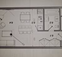 Layout of a 1-bedroom apartment with furnishings: kitchen, bathroom, and living room with dining area.