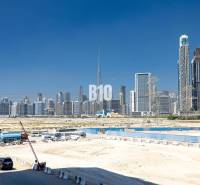 Dubai skyline with a view of skyscrapers and construction sites.
