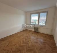 Entrance hallway in a 3-room apartment with doors and linoleum flooring.