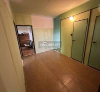 A room in a 3-room apartment with light walls and parquet flooring.