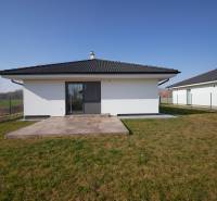 Family house on Kalinkovo Street in Rovinka with a terrace and lawn.