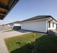 Family house on Nevädzová Street in Kalinkovo with parking and a lawn.