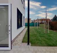 The garden at the offices on Široká Street in Nitra with open doors.