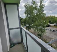 The balcony of a 2-room apartment on Žitavská Street in Senec, view of the parking lot.