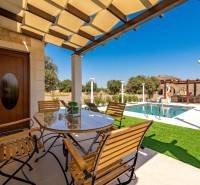 A family house in Bibinje with a terrace and a view of the pool and garden.