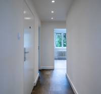 Hallway with lights and a view of the room on Boriny Street, 3-room apartment.