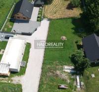 The area in Malatíny offers residential plots with existing buildings and natural surroundings.