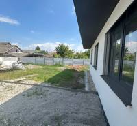 A family house in Žihárec with a view of the yard and adjacent properties.