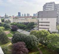 A view of the park and surrounding residential buildings in Bratislava, Ružinov district, on Jégého Street.