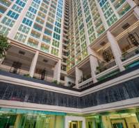 Apartment construction in Pattaya with vertical architecture and modern design at the forefront.