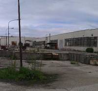 Abandoned warehouses and halls in Levice with dilapidated buildings and destroyed infrastructure.