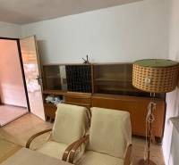 Retro room: old armchairs, table lamp, bookshelf; ideal for recreational properties.