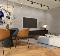 Living room in a two-room apartment with a comfortable armchair and artistic decoration.