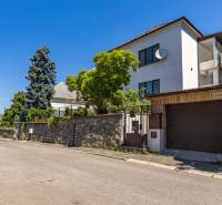 A family house on Gorazdova Street in Bratislava - Staré Mesto with greenery and a car.