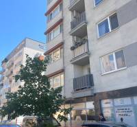 Apartment building on Lichnerova Street in Senec with commercial spaces and a parking lot.