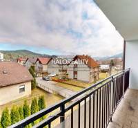 From the balcony, you can see picturesque houses and nature, ideal for a studio apartment.