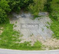 Land designated for residential use in Selce, surrounded by greenery near the road.