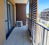 The balcony of a 2-room apartment on Žltá Street in Bratislava - Petržalka with a view of the surroundings.