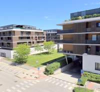 A view of parking and apartment buildings in Petržalka on Žltá Street, Bratislava.