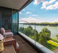 A balcony in a 3-room apartment with a view of the river and greenery, Pribinova, Bratislava.