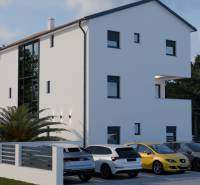 White building next to parked cars in Mandre, near the forest, for a 4-room apartment.