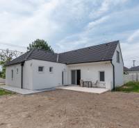 A family house on Stará Gala in Holice with a terrace and a yard without a lawn.
