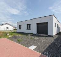 A family house in Zohor with a spacious parking area and a large garage.