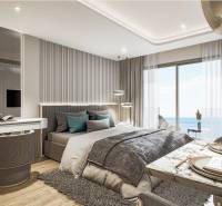 A bedroom with elegant furniture and a sea view, Apartment construction.