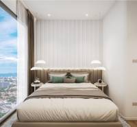 Stylish bedroom in a 3-room apartment with a view of the city.