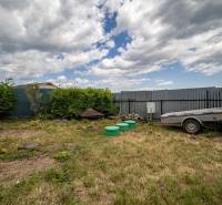 Plots - housing on Svetlá Street in Košice, Barca district; trailer and wood storage.