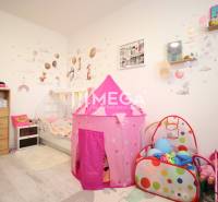 Children's room with a play tent and wall decorations in a 3-room apartment.