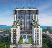 Construction of apartments in the city of Pattaya with sea views and green terraces.